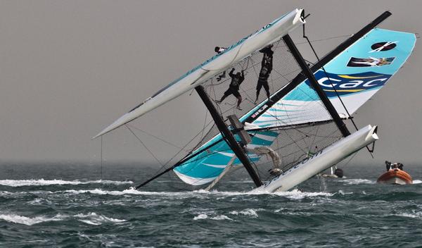 Yachts capsized as winds gusted to 30 knots on Day 3 of the Extreme 40 Series at Qingdao, China